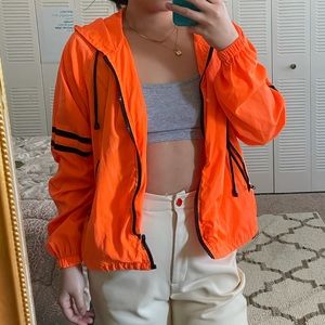 Orange wind breaker jacket